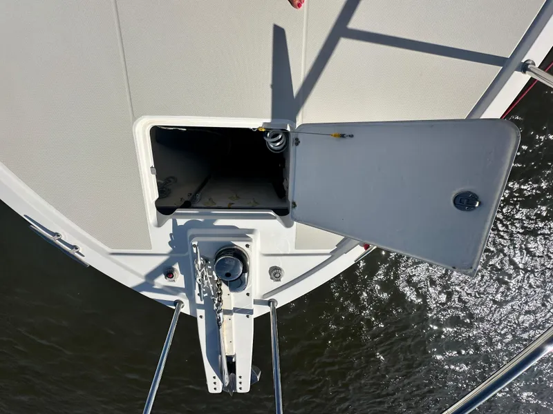 Slide: The Image of 2014 Back Cove 37 boat deck with open hatch and anchor chain. - 17