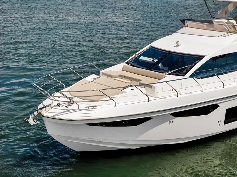 Slide: The Image of Azimut Fly 60 yacht, 2022 model, cruising on calm waters. - 13