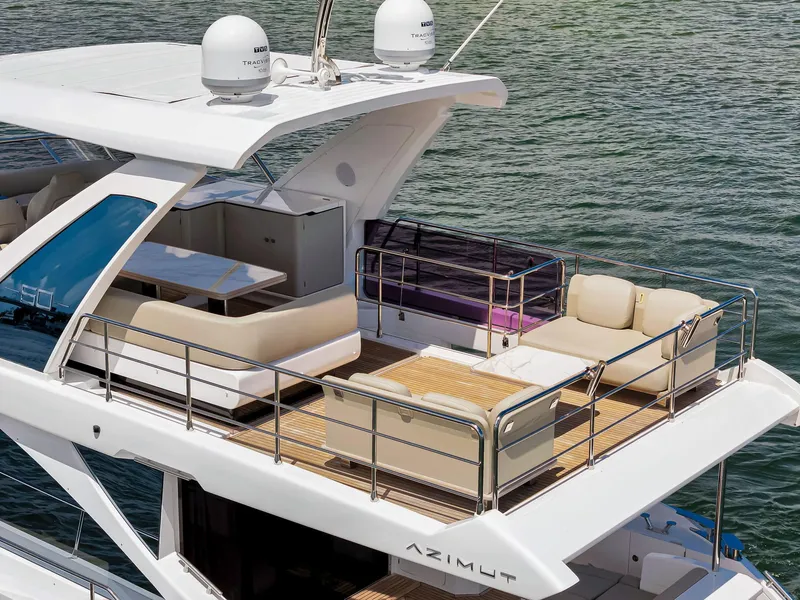Slide: The Image of Luxurious 2022 Azimut Fly 60 yacht with spacious upper deck and elegant seating. - 15