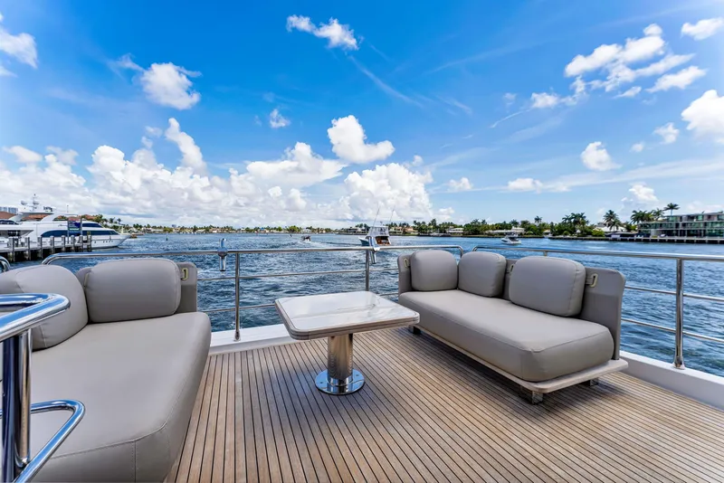 Slide: The Image of Luxurious 2022 Azimut Fly 60 yacht deck with comfortable seating and ocean view. - 18