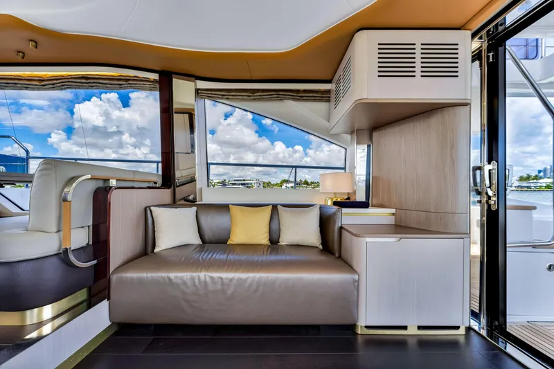Slide: The Image of Luxurious interior of 2022 Azimut Fly 60 yacht with modern seating and scenic views. - 30