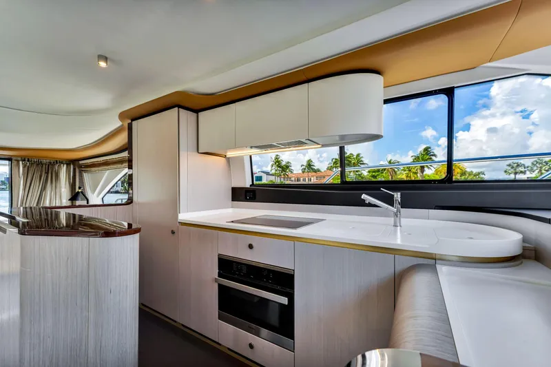 Slide: The Image of Luxurious interior of 2022 Azimut Fly 60 yacht with modern kitchen design. - 34