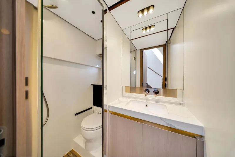 Slide: The Image of Luxurious bathroom in 2022 Azimut Fly 60 yacht with modern fixtures and elegant design. - 42