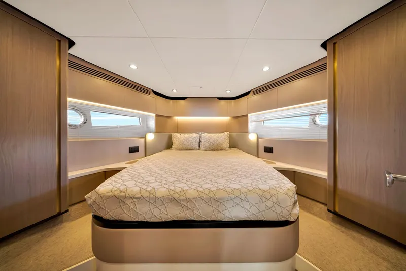 Slide: The Image of Luxurious bedroom interior of 2022 Azimut Fly 60 yacht with modern design and ambient lighting. - 46