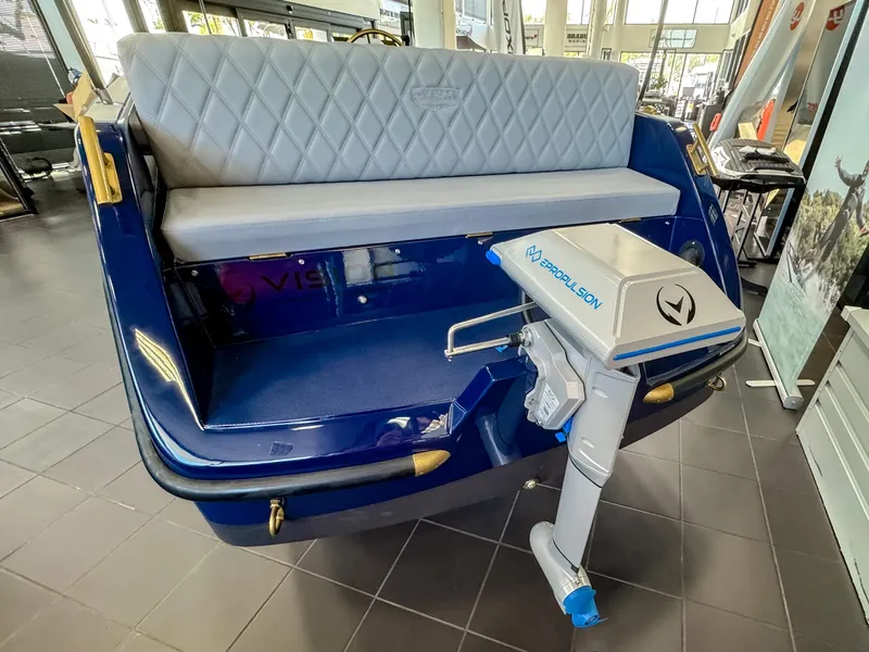 Slide: The Image of 2025 Vision Marine Technologies Volt 180 boat with electric propulsion system in showroom. - 8