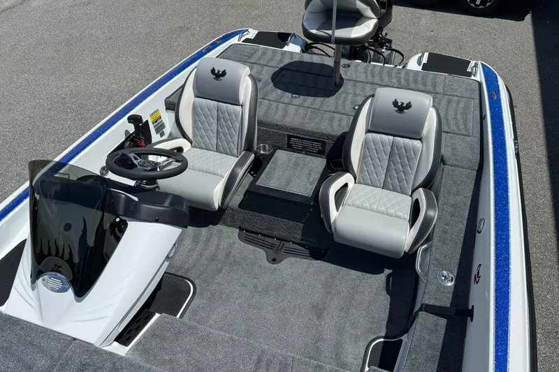 Slide: The Image of 2026 Phoenix ZXL 818 PRO boat interior with dual seats and steering console. - 11