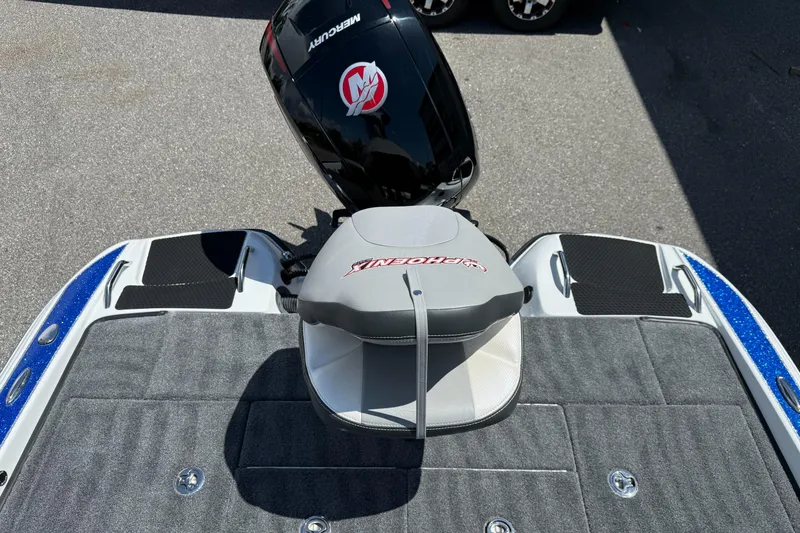Slide: The Image of 2026 Phoenix ZXL 818 PRO boat with Mercury engine, featuring a spacious deck and seating. - 13
