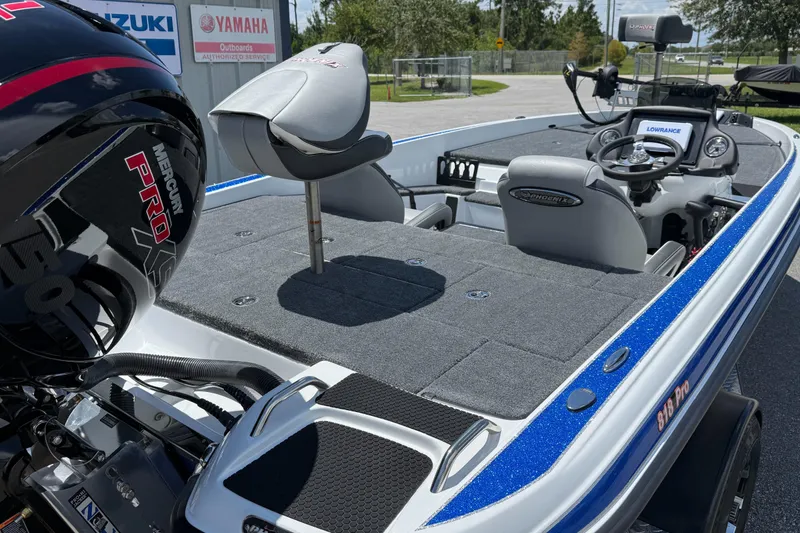 Slide: The Image of 2026 Phoenix ZXL 818 PRO boat with Mercury engine, featuring spacious deck and advanced controls. - 7