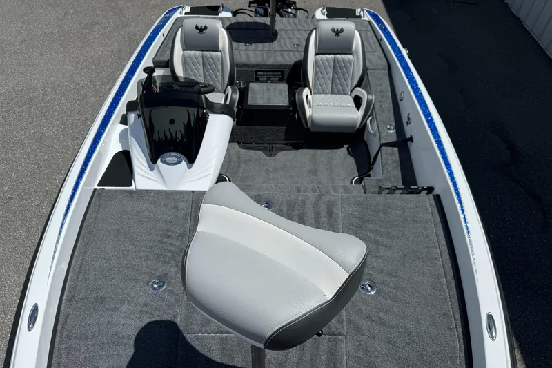 Slide: The Image of 2026 Phoenix ZXL 818 PRO boat interior with gray seating and carpeted deck. - 8
