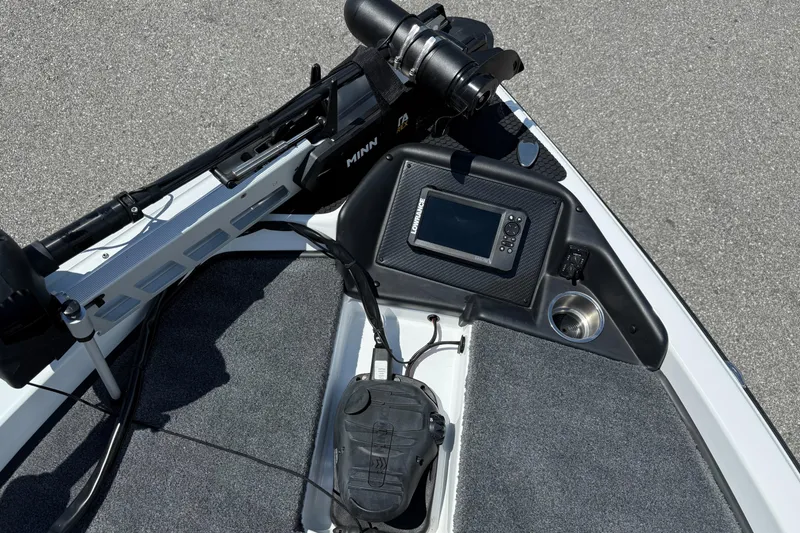 Slide: The Image of Bow of Phoenix ZXL 818 PRO 2026 boat with navigation equipment and trolling motor. - 9