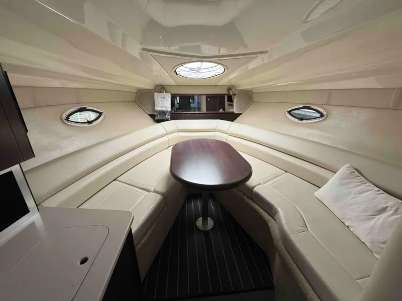 Slide: The Image of Interior of 2013 Monterey 280 SCR boat with elegant seating and table. - 10