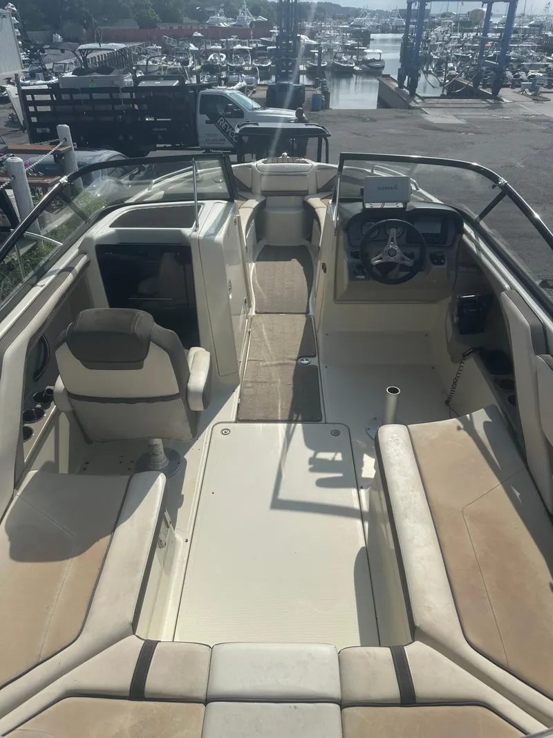 Slide: The Image of 2015 Yamaha Boats 242 Limited interior view at marina. - 12