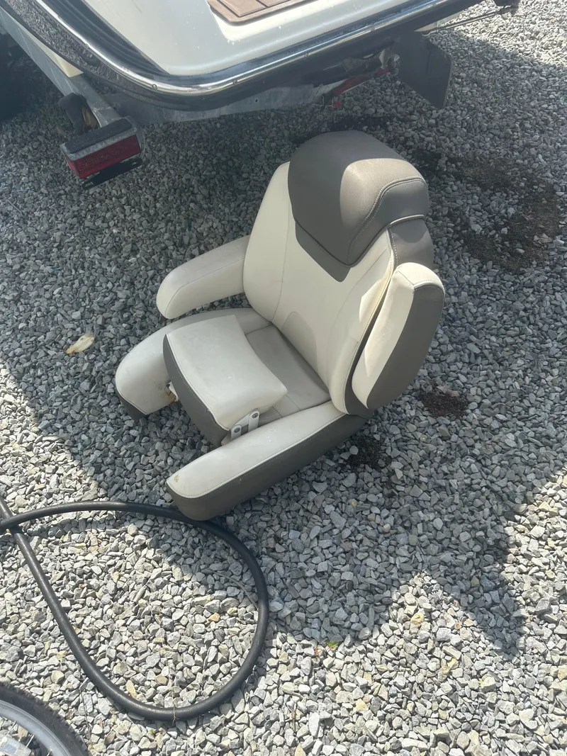 Slide: The Image of Boat seat from a 2015 Yamaha 242 Limited on gravel surface. - 14