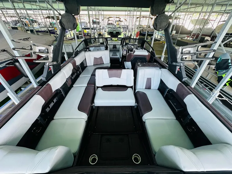 Slide: The Image of 2022 Malibu Wakesetter 24 MXZ interior with spacious seating and modern design. - 13