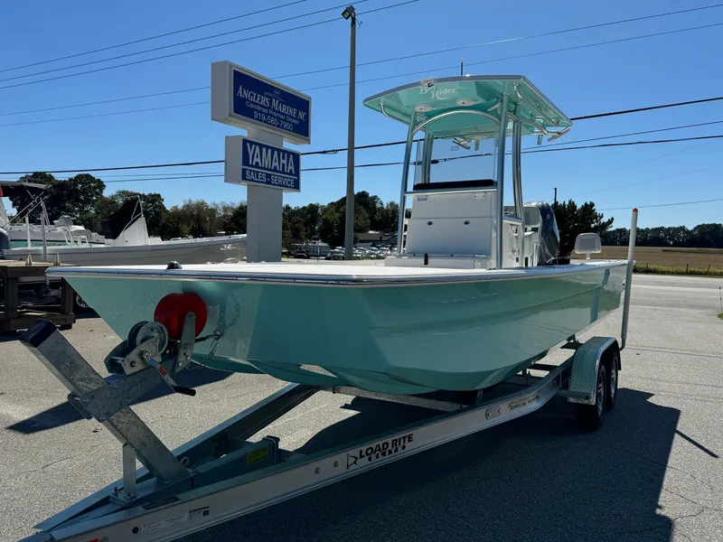 Slide: The Image of 2025 Bay Rider 2260 Skiff on trailer at Anglers Marine NC dealership. - 2