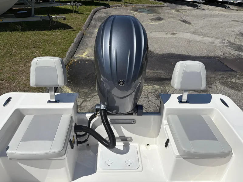Slide: The Image of 2025 Bay Rider 2260 Skiff boat with dual seats and outboard motor. - 8
