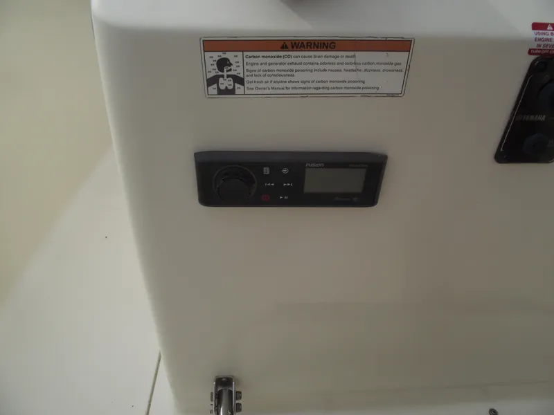 Slide: The Image of Control panel on 2018 Scout 175 Sportfish boat with warning label. - 22