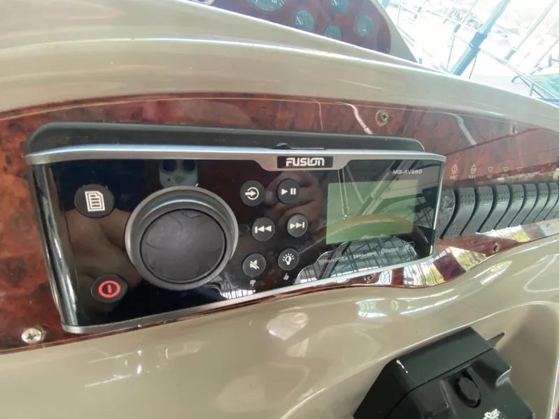 Slide: The Image of 1998 Maxum 3700 SCR dashboard with Fusion MS-AV650 stereo system. - 14