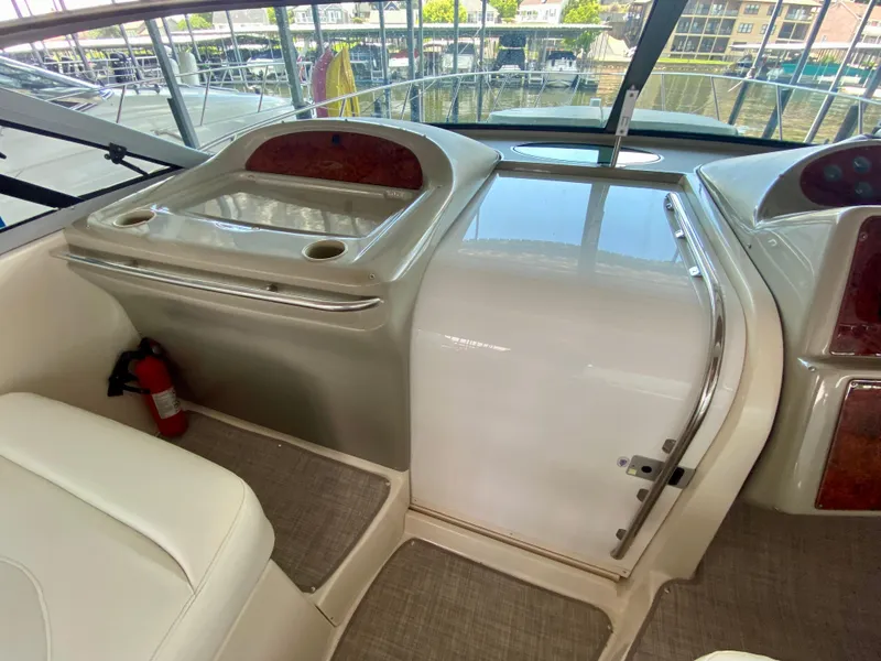 Slide: The Image of 1998 Maxum 3700 SCR yacht interior with sink and fire extinguisher. - 24