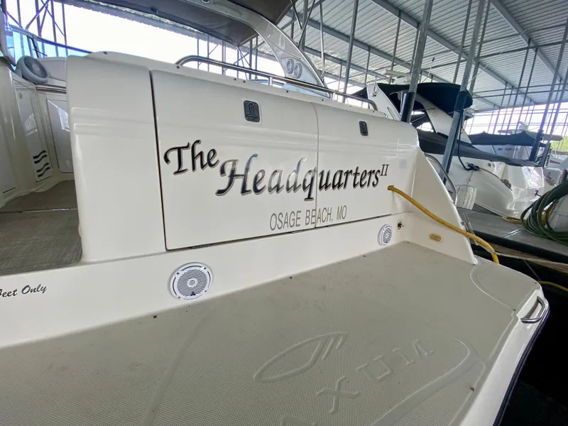 Slide: The Image of 1998 Maxum 3700 SCR boat named "The Headquarters II" docked at Osage Beach, MO. - 4