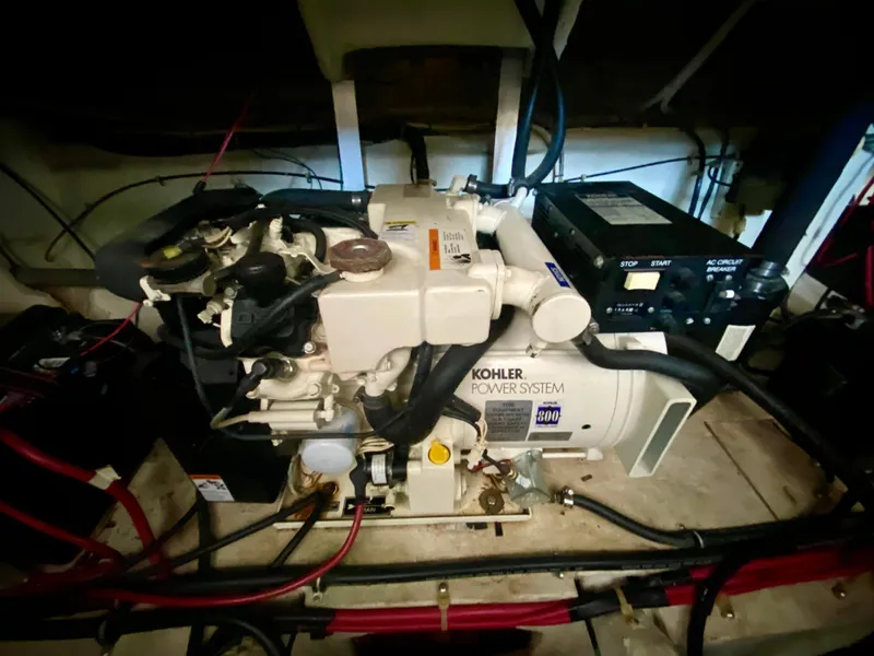 Slide: The Image of Engine compartment of a 1998 Maxum 3700 SCR with Kohler power system. - 41