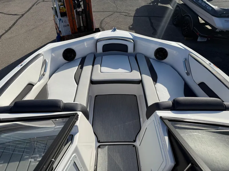 Slide: The Image of 2025 Yamaha Boats SX195 interior with sleek seating and modern design. - 11
