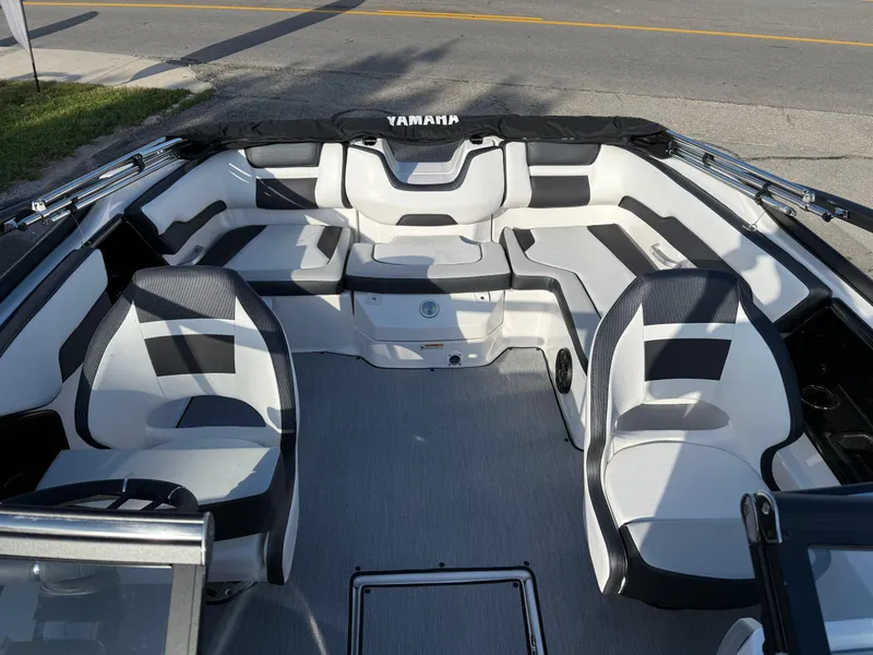 Slide: The Image of 2025 Yamaha Boats SX195 interior with sleek seating and modern design. - 12