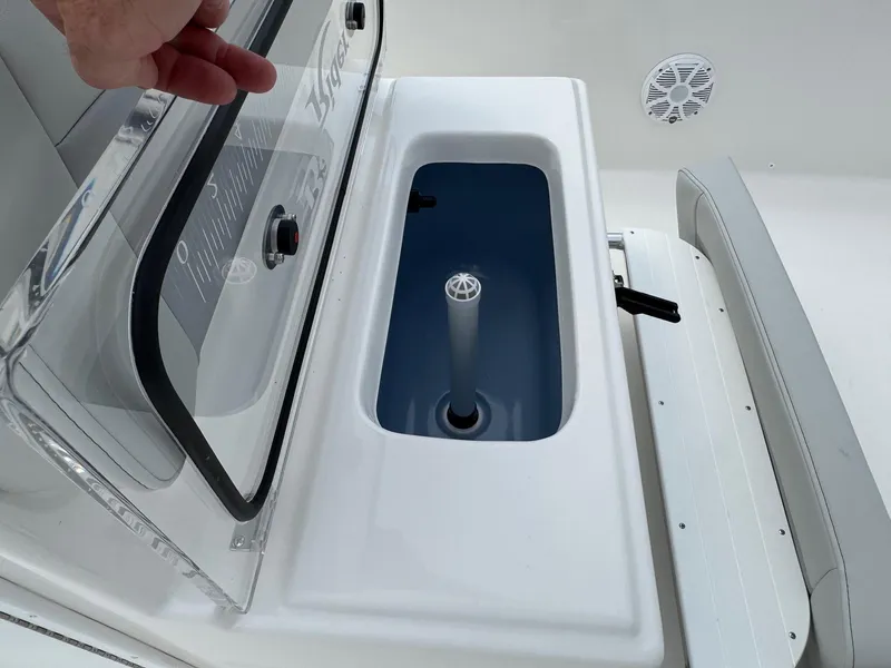 Slide: The Image of 2025 Bay Rider 2060 Skiff livewell with open lid and ruler markings. - 11