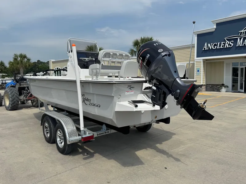 Slide: The Image of 2025 Bay Rider 2060 Skiff on trailer outside Anglers Marine dealership. - 3