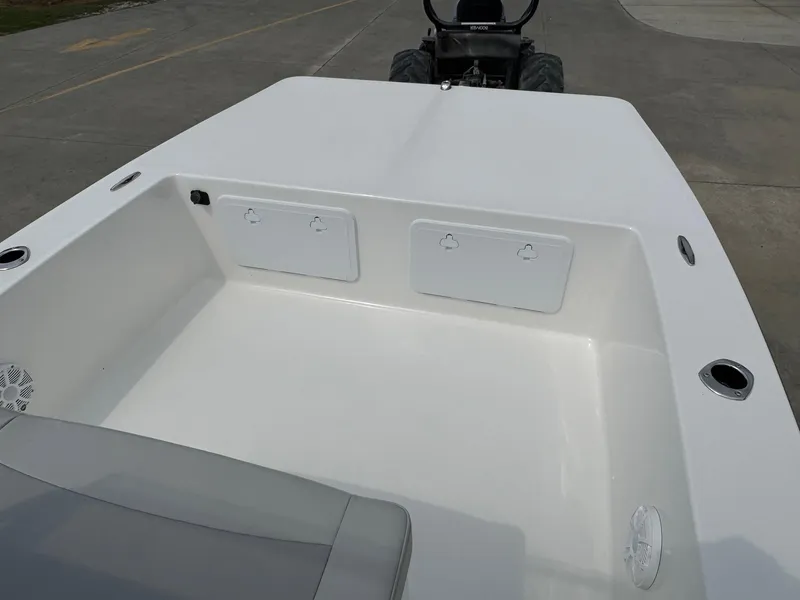 Slide: The Image of Bay Rider 2060 Skiff 2025 boat interior with storage compartments and sleek design. - 9