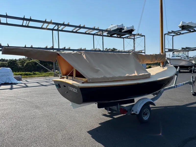 Slide: The Image of 2004 Custom Barnstable Cat Boat on trailer, covered and ready for transport. - 4