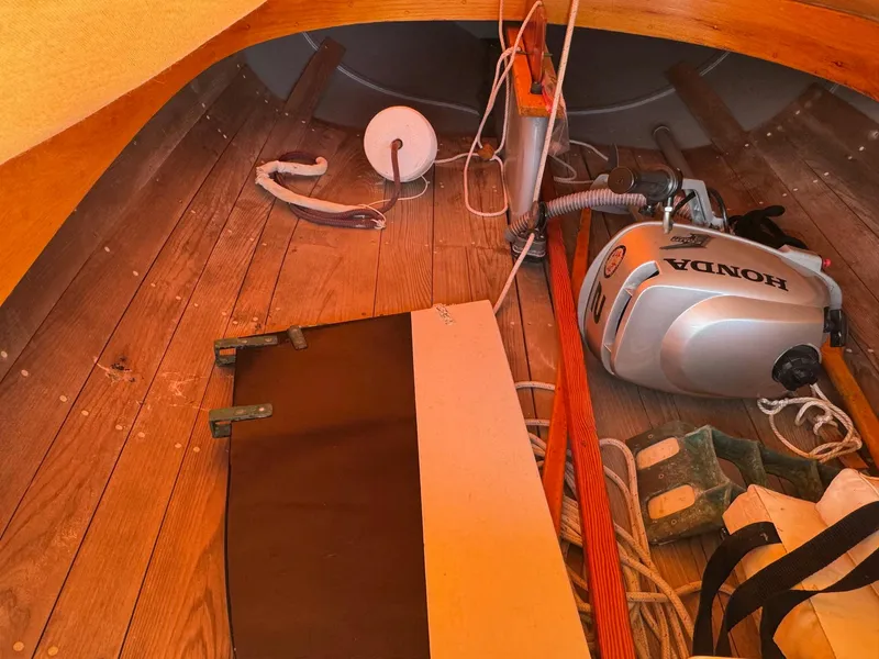 Slide: The Image of Interior of a 2004 Custom Barnstable Cat Boat with Honda engine and nautical equipment. - 7