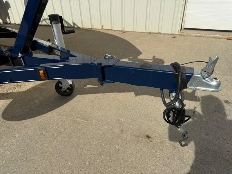 Slide: The Image of Trailer hitch of a 2015 Cobalt 220 boat on concrete surface. - 30