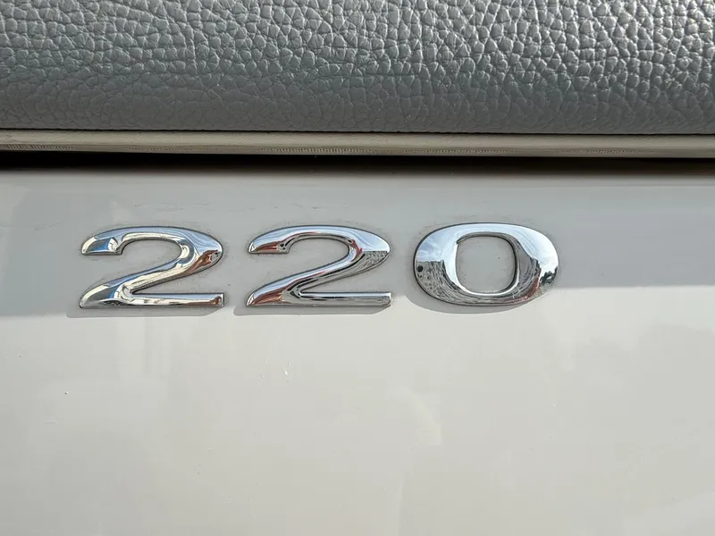 Slide: The Image of Chrome "220" emblem on a 2015 Cobalt model. - 5