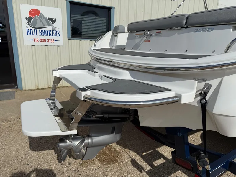 Slide: The Image of 2015 Cobalt 220 boat rear view with swim platform at Boji Brokers. - 8