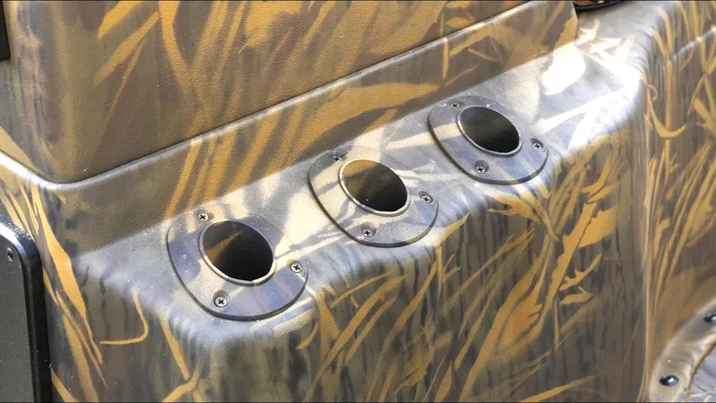 Slide: The Image of Camouflage-patterned G3 Bay 17 boat console with three rod holders, 2025 model. - 10