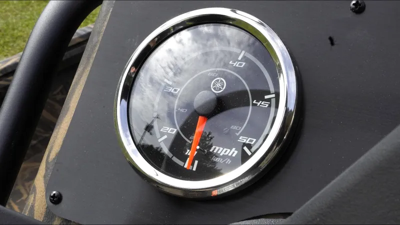 Slide: The Image of Close-up of a 2025 G3 Bay 17 speedometer, displaying mph and km/h. - 18