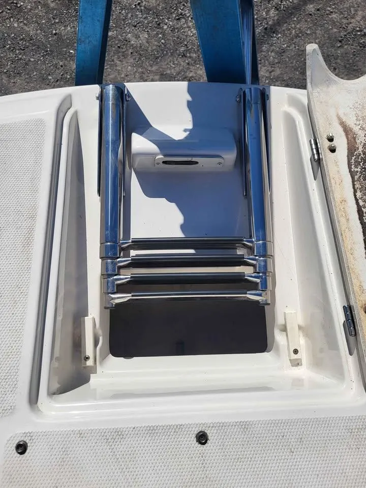 Slide: The Image of Foldable stainless steel boat ladder on a 2005 Monterey 263 ES Explorer. - 4