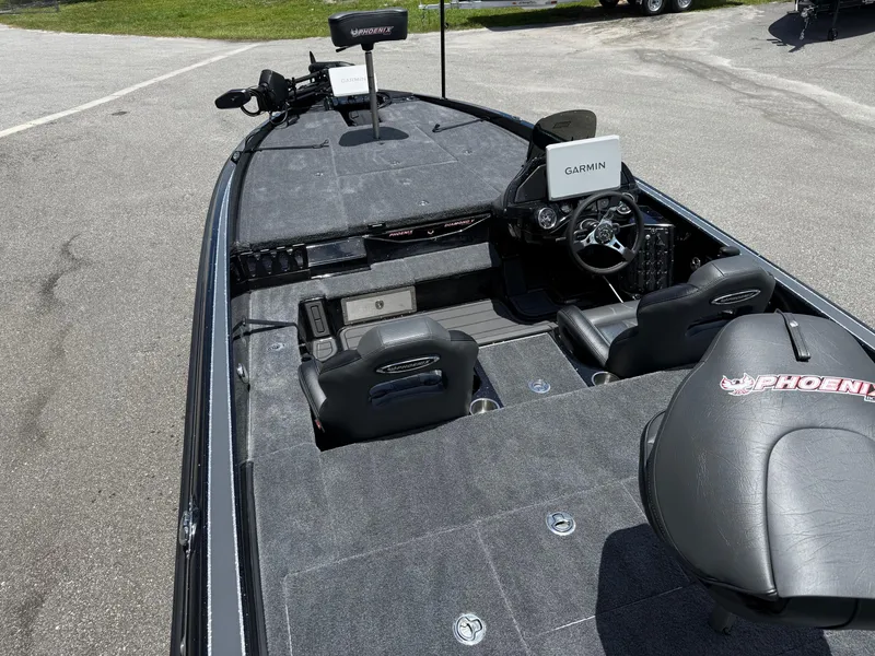 Slide: The Image of 2026 Phoenix 920 ELITE X II boat interior with Garmin navigation system. - 12