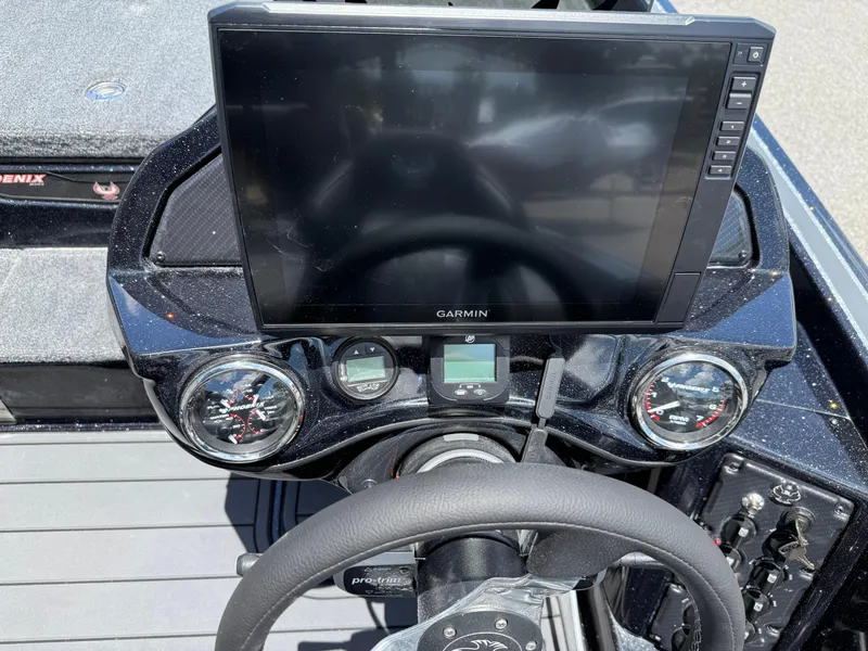 Slide: The Image of Dashboard of 2026 Phoenix 920 ELITE X II with Garmin display and gauges. - 15