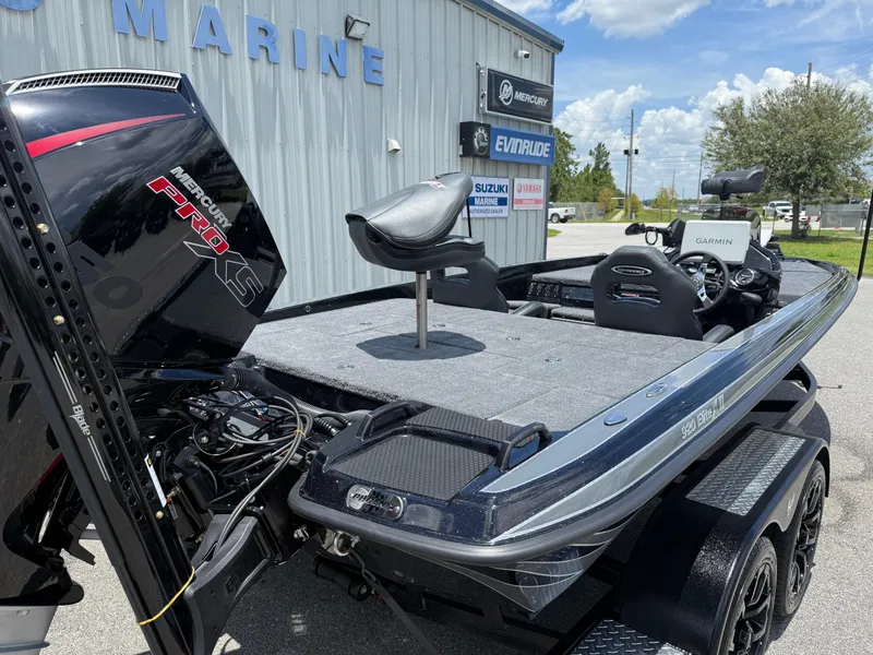 Slide: The Image of 2026 Phoenix 920 ELITE X II boat with Mercury Pro XS engine at marine dealership. - 17
