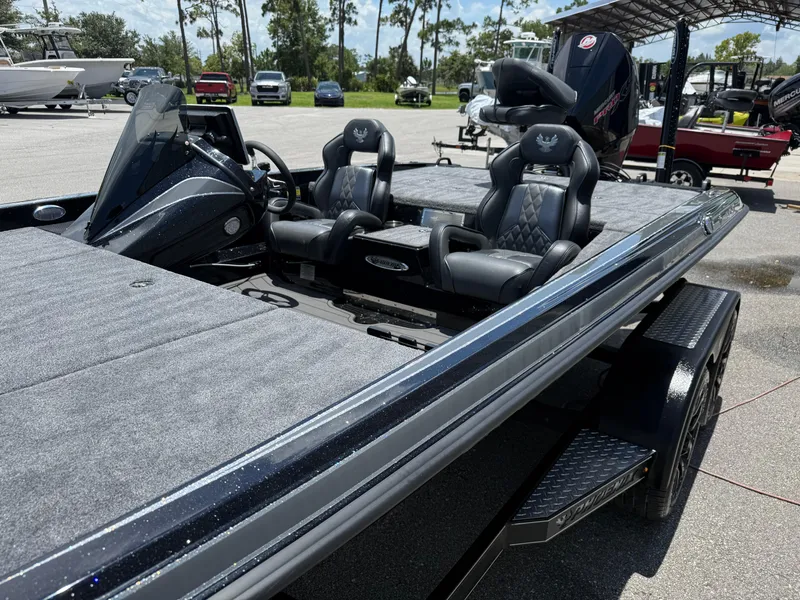 Slide: The Image of 2026 Phoenix 920 ELITE X II boat with sleek design and luxurious seating. - 4