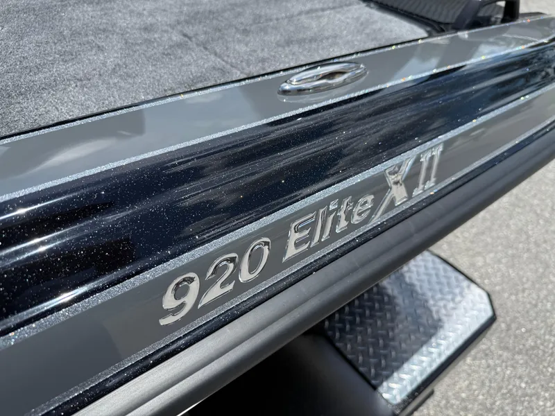 Slide: The Image of Close-up of 2026 Phoenix 920 Elite X II boat detail with metallic finish. - 6