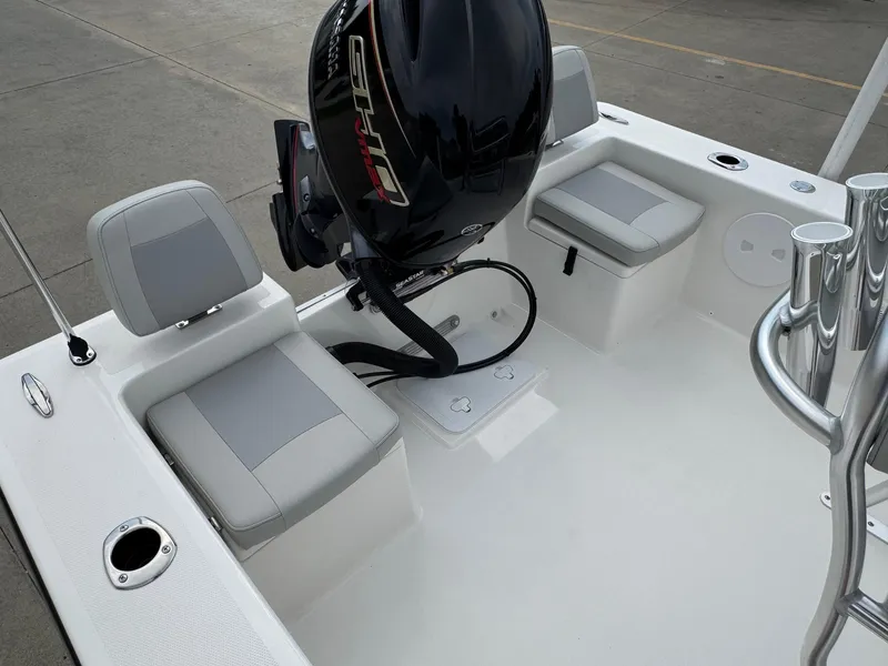 Slide: The Image of 2025 Bay Rider 2060 Skiff interior with seating and outboard motor. - 15