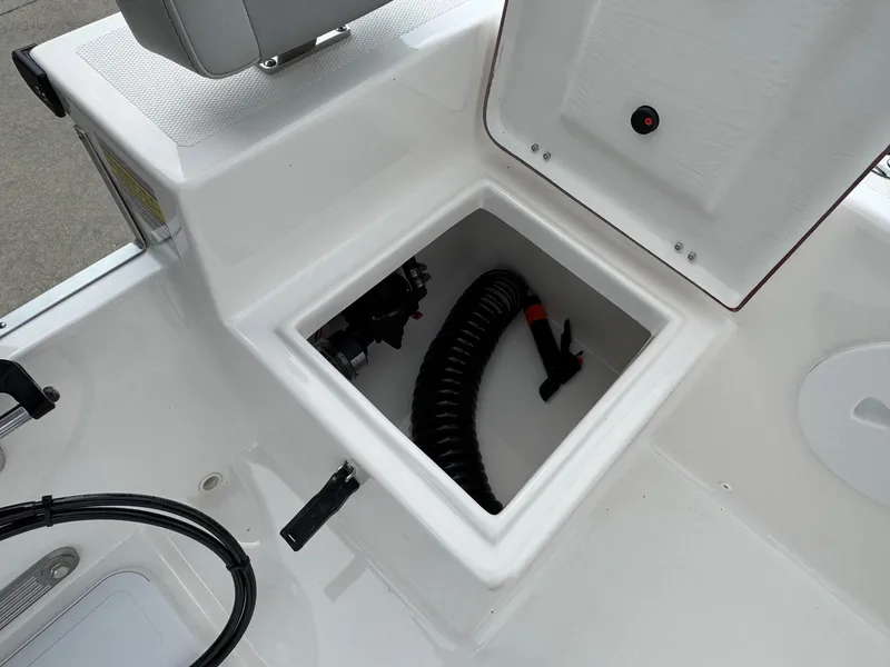 Slide: The Image of Open storage compartment on 2025 Bay Rider 2060 Skiff boat. - 19