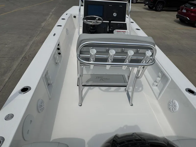 Slide: The Image of 2025 Bay Rider 2060 Skiff interior with steering console and rod holders. - 6