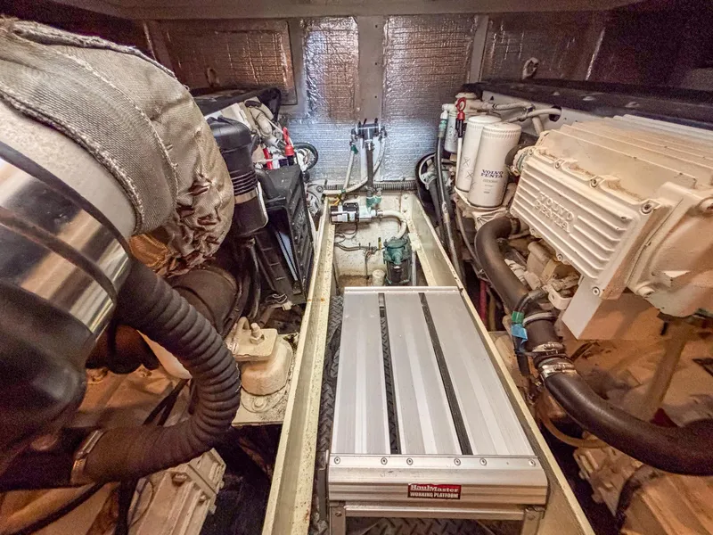 Slide: The Image of Engine room of 2007 Silverton 38 Convertible yacht, featuring Volvo Penta components. - 27