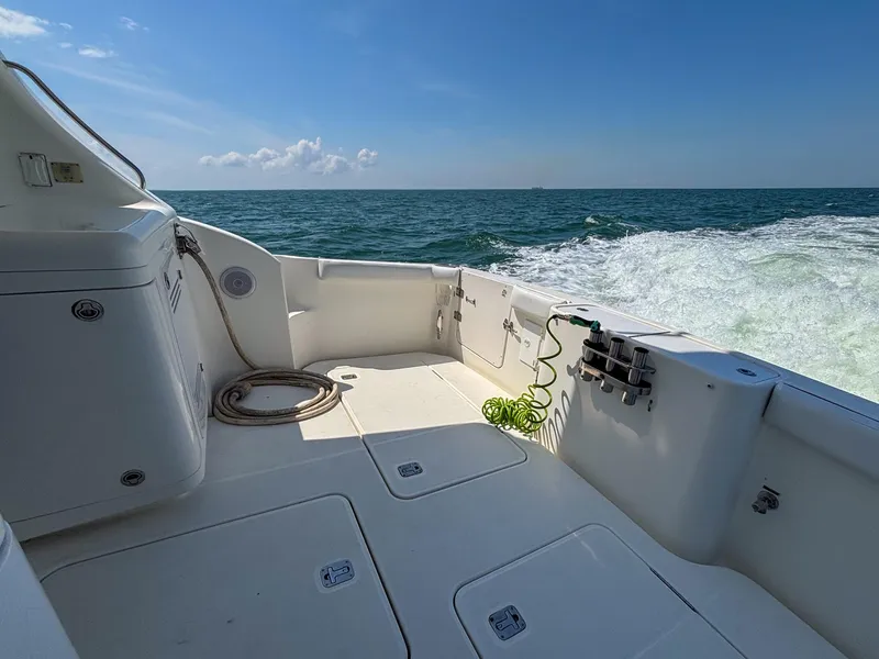 Slide: The Image of 2007 Silverton 38 Convertible boat deck with ocean view and clear sky. - 6