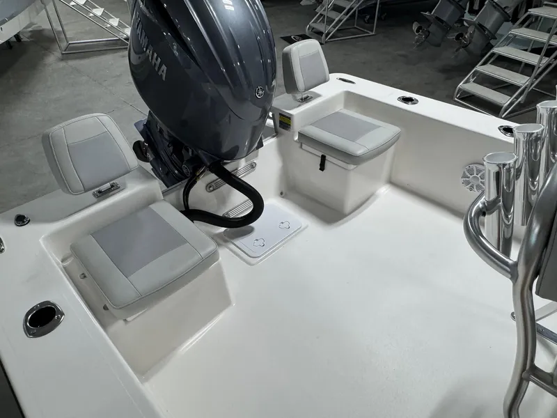 Slide: The Image of 2026 Bay Rider 2260 FS Skiff interior with Yamaha engine and seating. - 18