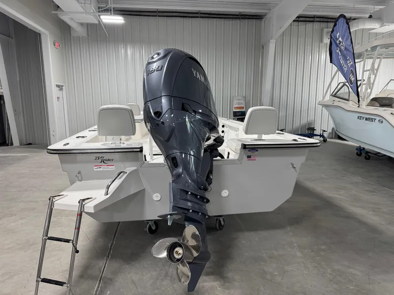 Slide: The Image of 2026 Bay Rider 2260 FS Skiff with Yamaha outboard motor in showroom. - 4